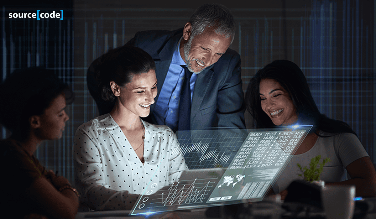  Team of IT professionals discussing outsourcing strategies